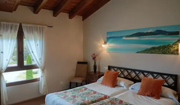 Interior de una habitación del Hotel El Rincon de Yaxu