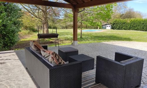 Porche cubierto con terraza de la villa el tinganon